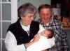 My parents Frank and Barbara holding my nephew Jake